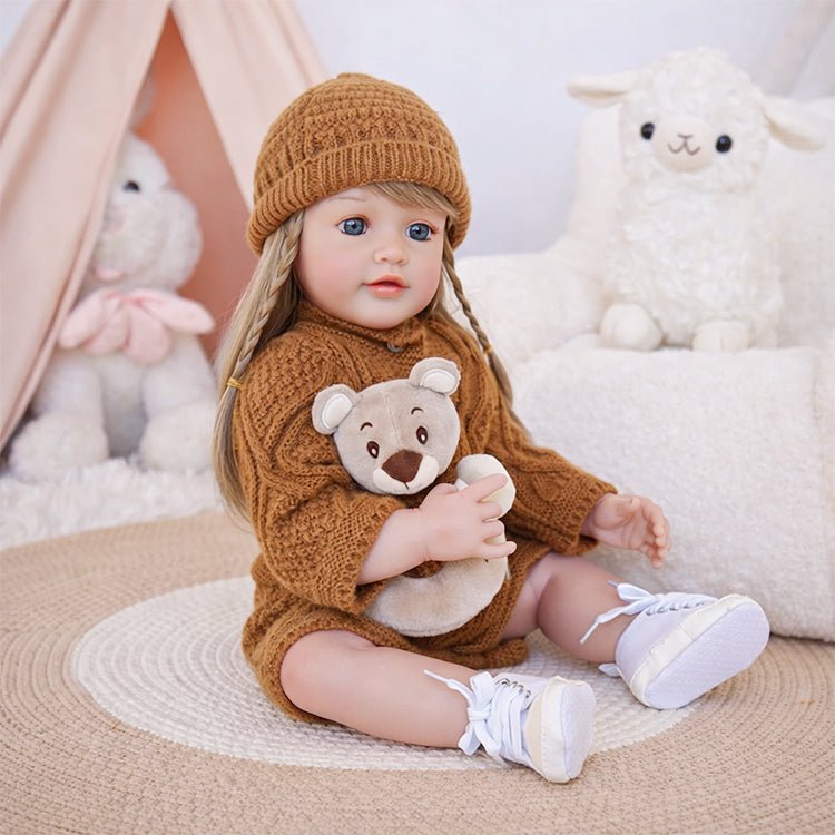 Chimidoll - encantadora muñeca de niño pequeño con atuendo castaño y cabello largo y amarillo.
