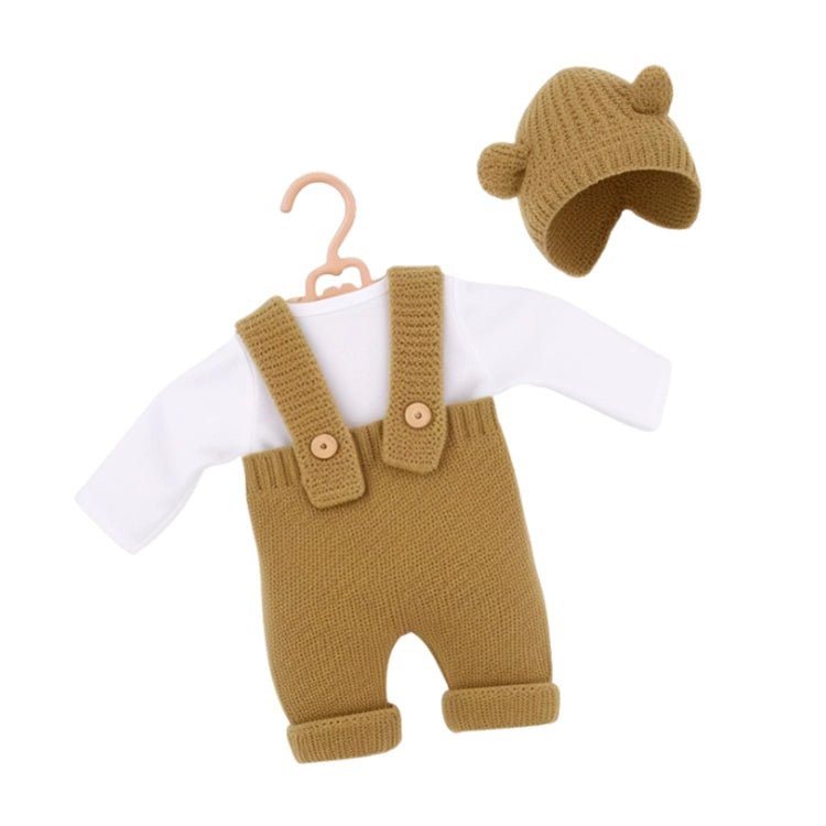Complete brown knit reborn doll clothes set with white cotton long-sleeve bodysuit, textured suspenders featuring two decorative wood buttons, and matching ribbed bonnet for 20-inch dolls