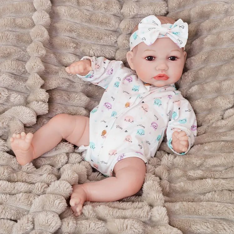 realistic baby doll | newborn dolls | life like baby dolls | soothing feel | hand-painted skin | weighted like a real baby | poseable limbs | premium quality | adorable outfit