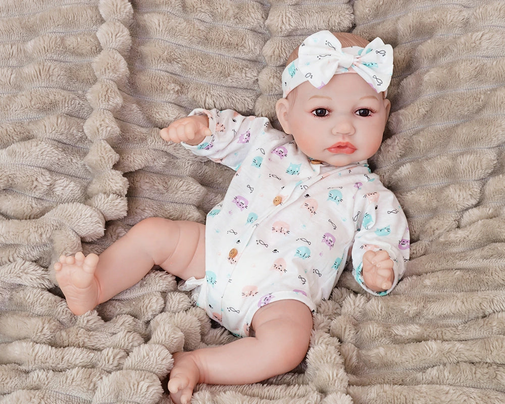 realistic baby doll | newborn dolls | life like baby dolls | soothing feel | hand-painted skin | weighted like a real baby | poseable limbs | premium quality | adorable outfit