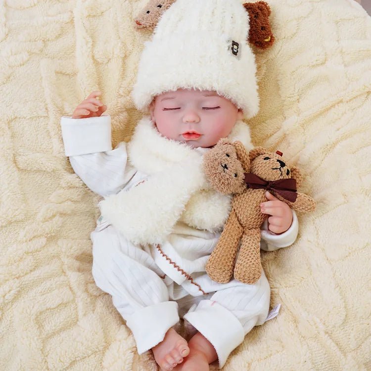 realistic baby doll | newborn dolls | life like baby dolls | soothing feel | hand-painted skin | weighted like a real baby | poseable limbs | premium quality | adorable outfit