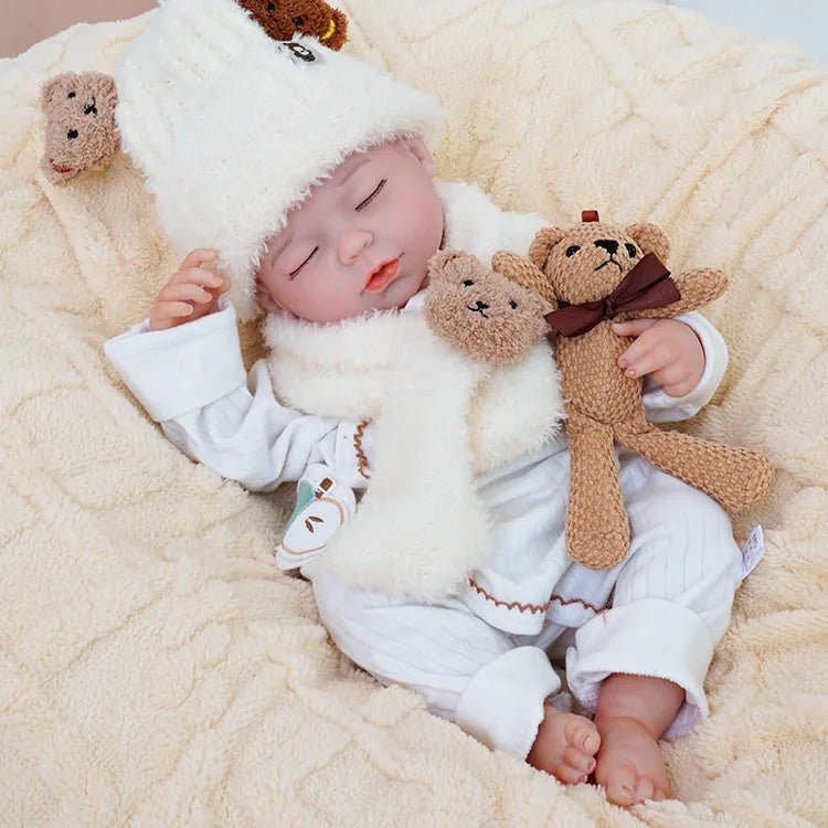 realistic baby doll | newborn dolls | life like baby dolls | soothing feel | hand-painted skin | weighted like a real baby | poseable limbs | premium quality | adorable outfit