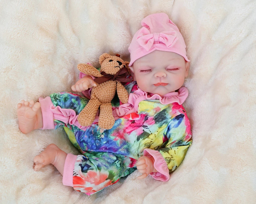 reborn baby doll | baby dolls | real life baby dolls | real baby dolls | newborn baby dolls | dolls that look real | ultra-soft vinyl | hand-rooted hair | gentle touch | realistic eyes | collectible doll