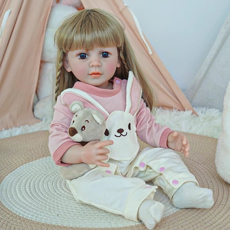 reborn toddler doll, dressed in a pink bunny onesie ensemble - chimidoll