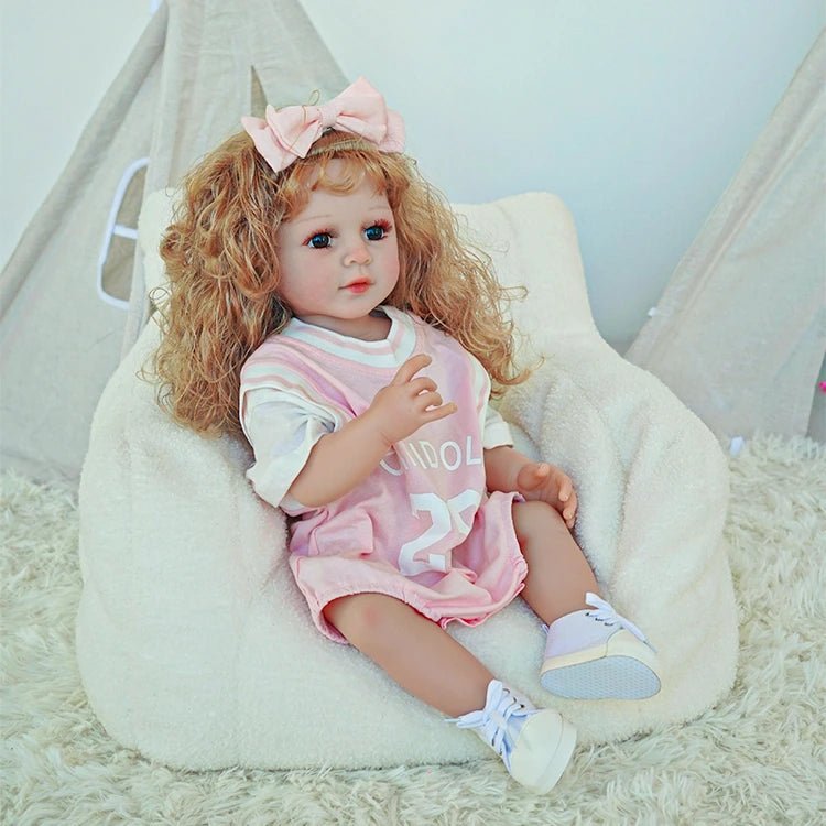 reborn toddler doll, curly hair wearing a pink basketball jersey - chimidoll