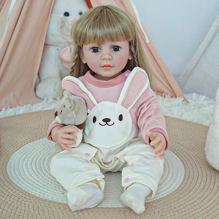 reborn toddler doll, dressed in a pink bunny onesie ensemble - chimidoll