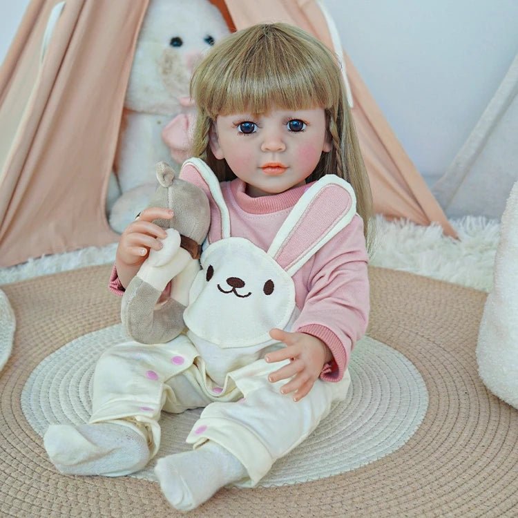 reborn toddler doll, dressed in a pink bunny onesie ensemble - chimidoll