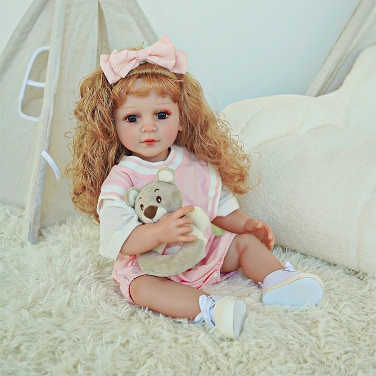reborn toddler doll, curly hair wearing a pink basketball jersey - chimidoll