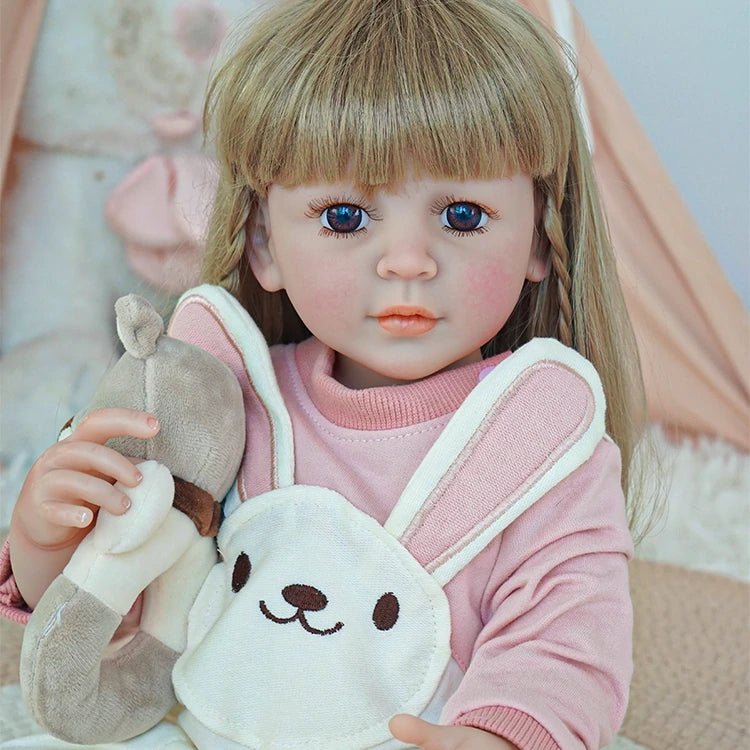 reborn toddler doll, dressed in a pink bunny onesie ensemble - chimidoll