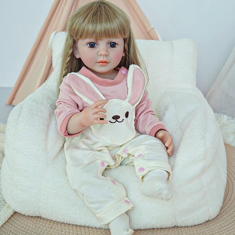 reborn toddler doll, dressed in a pink bunny onesie ensemble - chimidoll