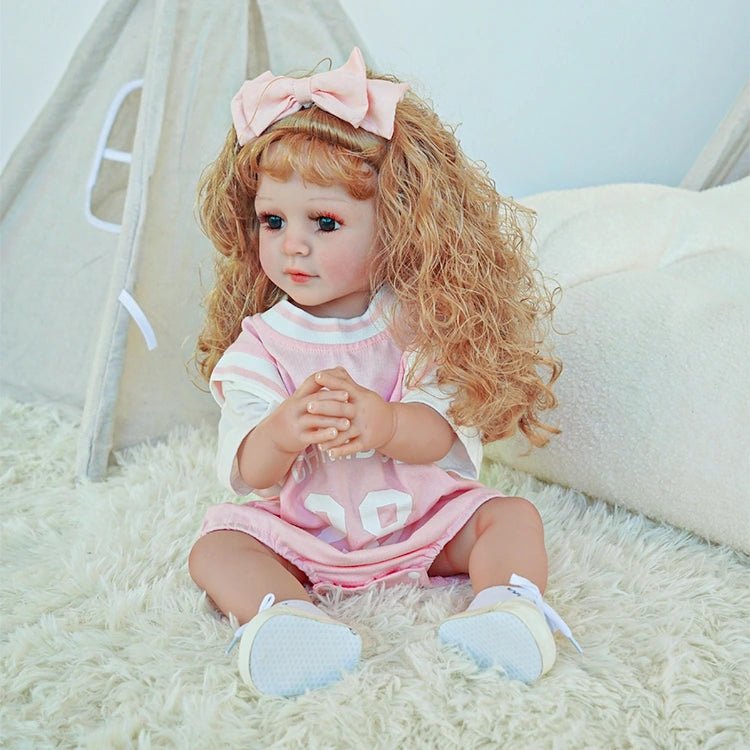 reborn toddler doll, curly hair wearing a pink basketball jersey - chimidoll
