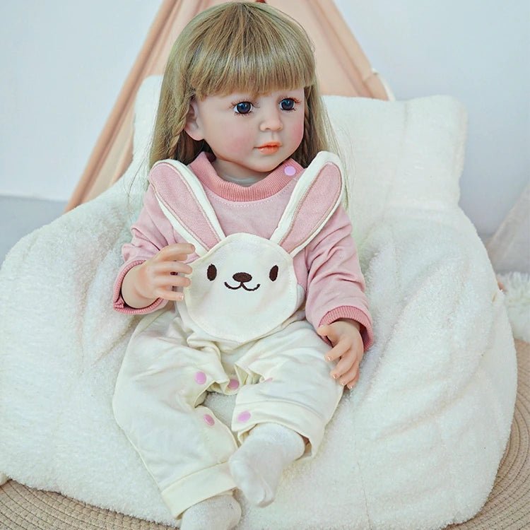 reborn toddler doll, dressed in a pink bunny onesie ensemble - chimidoll