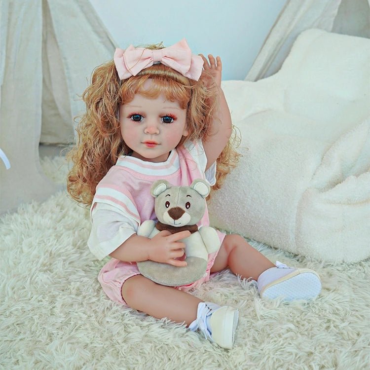 reborn toddler doll, curly hair wearing a pink basketball jersey - chimidoll