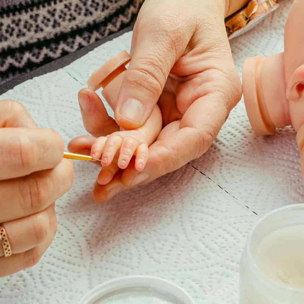 Painting reborn baby doll finger nails