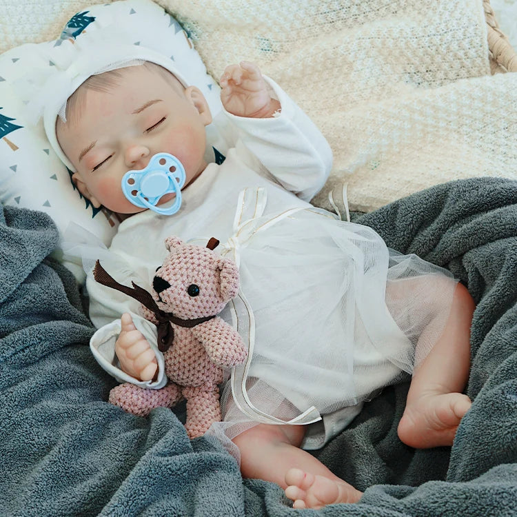 baby dolls | reborn baby dolls | reborn dolls sleeping | reborn doll toys | 20 inch reborn dolls | preemie reborn dolls | authentic detailing | intricate artistry | gentle realism | snuggly finish | collectible charm