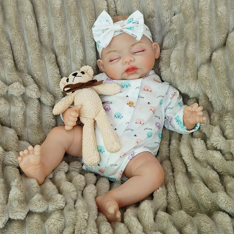 baby dolls | reborn baby dolls | reborn dolls sleeping | reborn doll toys | 20 inch reborn dolls | preemie reborn dolls | authentic detailing | intricate artistry | gentle realism | snuggly finish | collectible charm