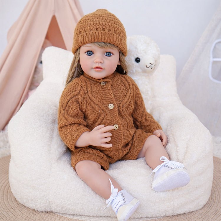 Chimidoll - encantadora muñeca de niño pequeño con atuendo castaño y cabello largo y amarillo.