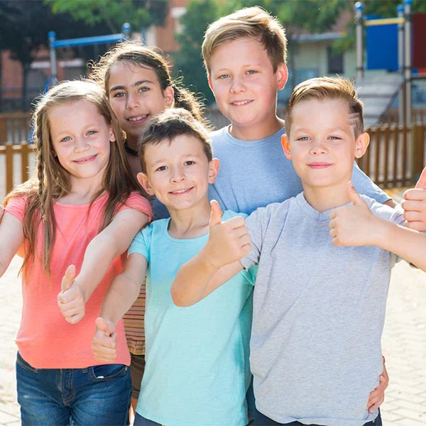 The children all gave thumbs-up gestures