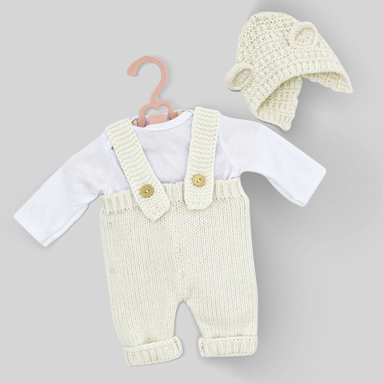 Ivory knit reborn doll clothes set with cotton suspenders overalls, white long-sleeve top and matching bonnet for 20-inch dolls, showcased on neutral grey background