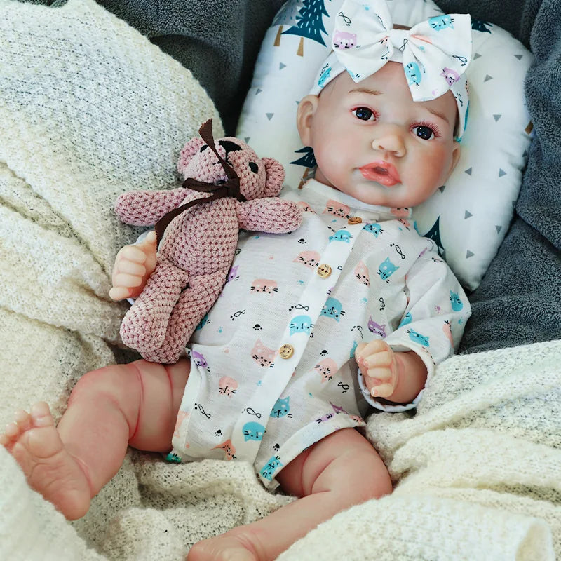 realistic baby doll | newborn dolls | life like baby dolls | soothing feel | hand-painted skin | weighted like a real baby | poseable limbs | premium quality | adorable outfit
