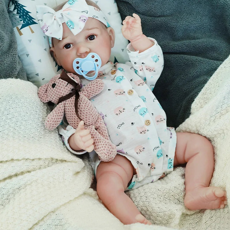 realistic baby doll | newborn dolls | life like baby dolls | soothing feel | hand-painted skin | weighted like a real baby | poseable limbs | premium quality | adorable outfit