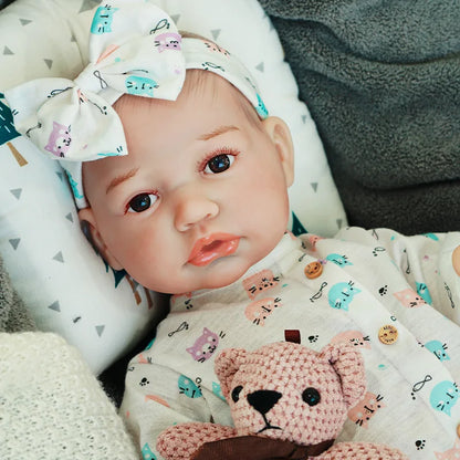 realistic baby doll | newborn dolls | life like baby dolls | soothing feel | hand-painted skin | weighted like a real baby | poseable limbs | premium quality | adorable outfit