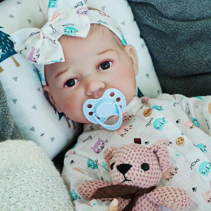 realistic baby doll | newborn dolls | life like baby dolls | soothing feel | hand-painted skin | weighted like a real baby | poseable limbs | premium quality | adorable outfit