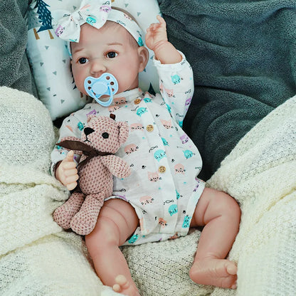 realistic baby doll | newborn dolls | life like baby dolls | soothing feel | hand-painted skin | weighted like a real baby | poseable limbs | premium quality | adorable outfit