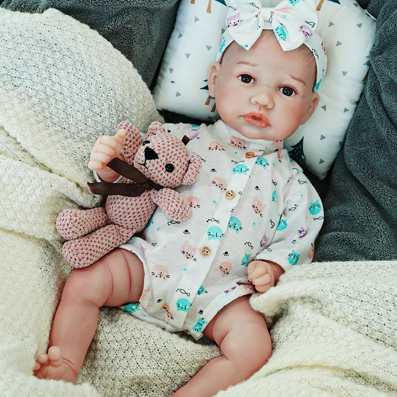 realistic baby doll | newborn dolls | life like baby dolls | soothing feel | hand-painted skin | weighted like a real baby | poseable limbs | premium quality | adorable outfit