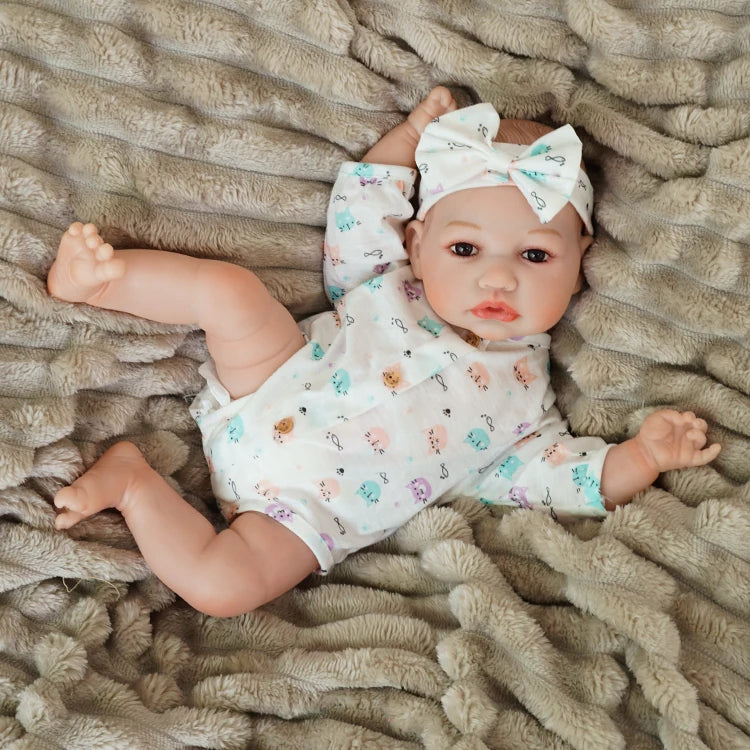 realistic baby doll | newborn dolls | life like baby dolls | soothing feel | hand-painted skin | weighted like a real baby | poseable limbs | premium quality | adorable outfit