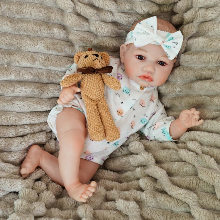 realistic baby doll | newborn dolls | life like baby dolls | soothing feel | hand-painted skin | weighted like a real baby | poseable limbs | premium quality | adorable outfit