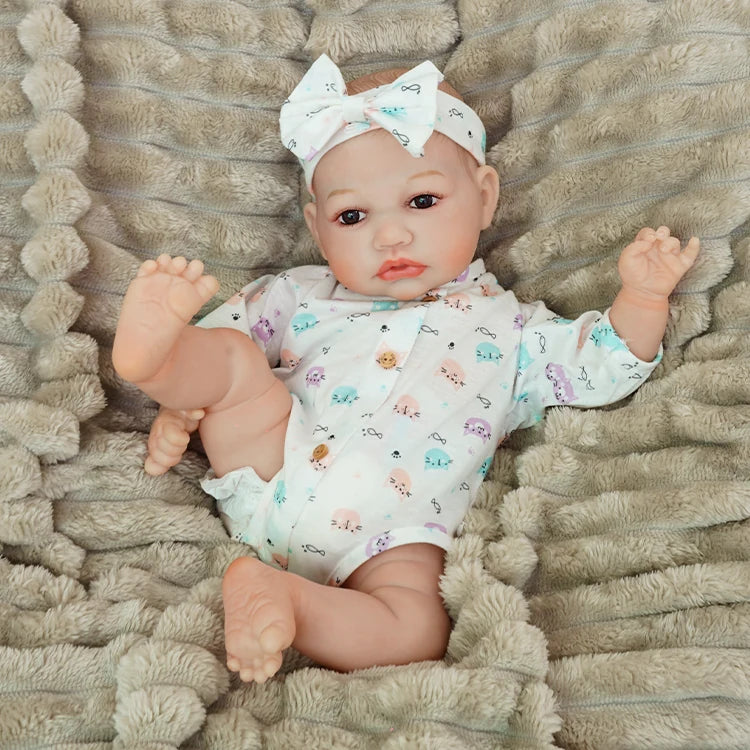 realistic baby doll | newborn dolls | life like baby dolls | soothing feel | hand-painted skin | weighted like a real baby | poseable limbs | premium quality | adorable outfit