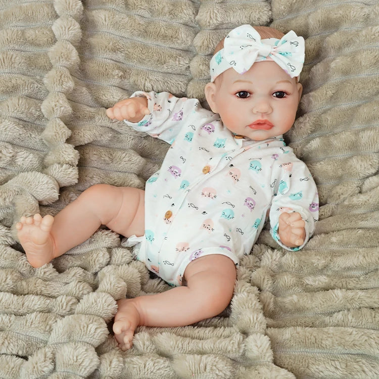 realistic baby doll | newborn dolls | life like baby dolls | soothing feel | hand-painted skin | weighted like a real baby | poseable limbs | premium quality | adorable outfit