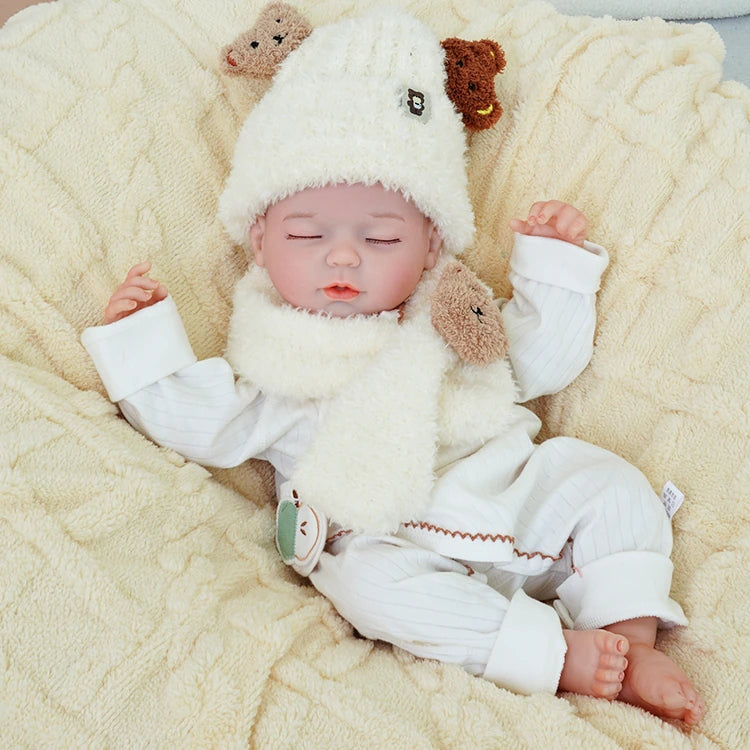 realistic baby doll | newborn dolls | life like baby dolls | soothing feel | hand-painted skin | weighted like a real baby | poseable limbs | premium quality | adorable outfit