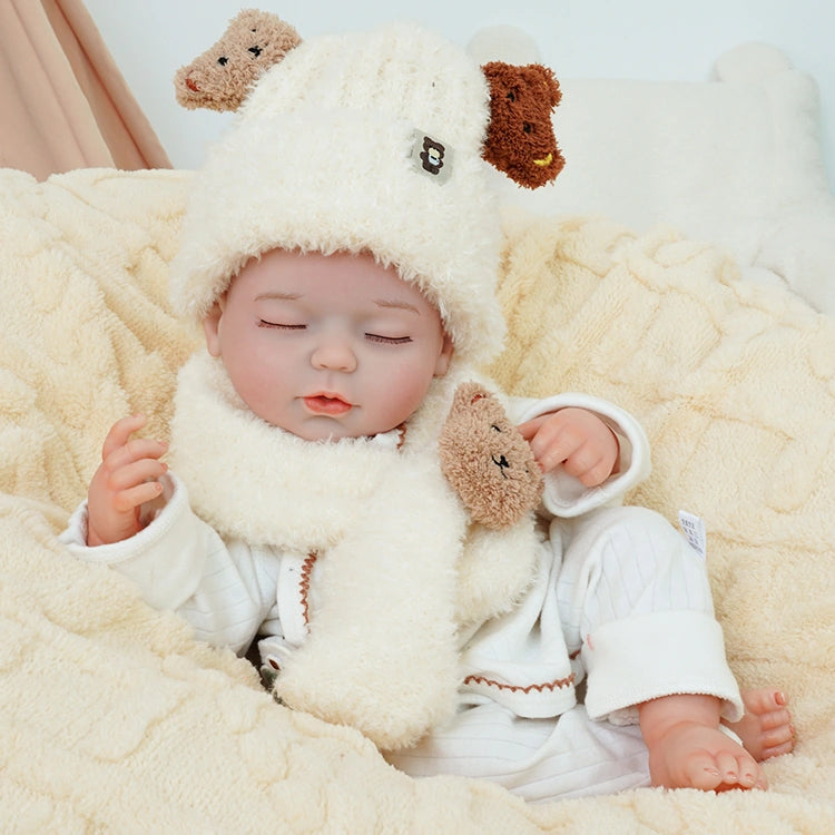realistic baby doll | newborn dolls | life like baby dolls | soothing feel | hand-painted skin | weighted like a real baby | poseable limbs | premium quality | adorable outfit