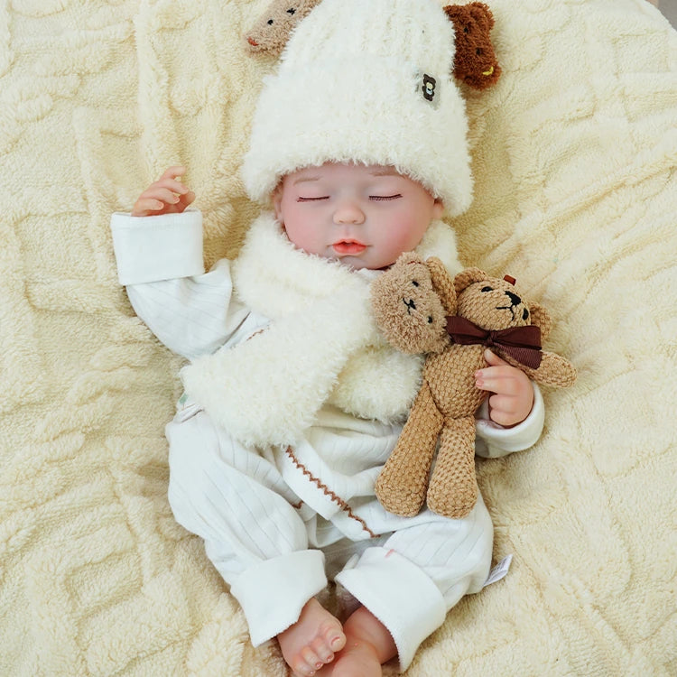 realistic baby doll | newborn dolls | life like baby dolls | soothing feel | hand-painted skin | weighted like a real baby | poseable limbs | premium quality | adorable outfit