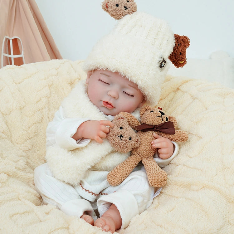 realistic baby doll | newborn dolls | life like baby dolls | soothing feel | hand-painted skin | weighted like a real baby | poseable limbs | premium quality | adorable outfit