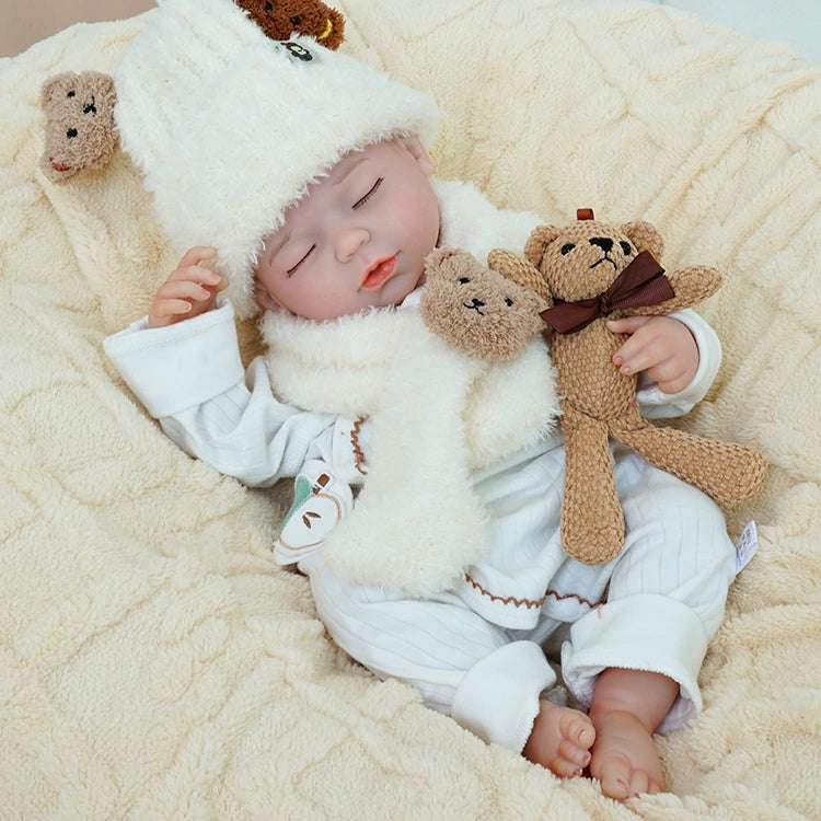 realistic baby doll | newborn dolls | life like baby dolls | soothing feel | hand-painted skin | weighted like a real baby | poseable limbs | premium quality | adorable outfit