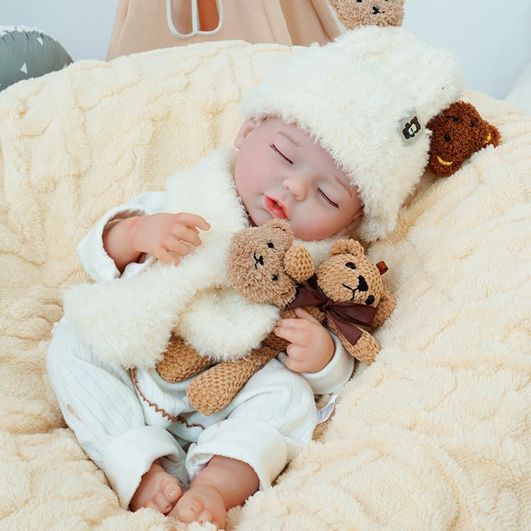 realistic baby doll | newborn dolls | life like baby dolls | soothing feel | hand-painted skin | weighted like a real baby | poseable limbs | premium quality | adorable outfit