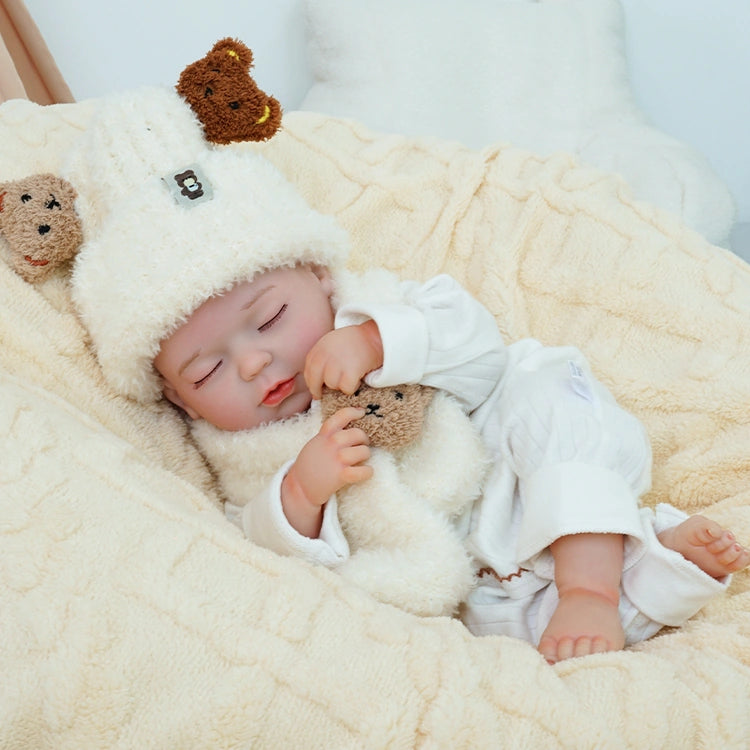 realistic baby doll | newborn dolls | life like baby dolls | soothing feel | hand-painted skin | weighted like a real baby | poseable limbs | premium quality | adorable outfit