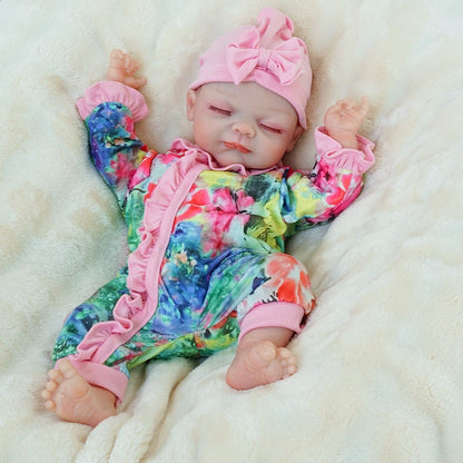 reborn baby doll | baby dolls | real life baby dolls | real baby dolls | newborn baby dolls | dolls that look real | ultra-soft vinyl | hand-rooted hair | gentle touch | realistic eyes | collectible doll