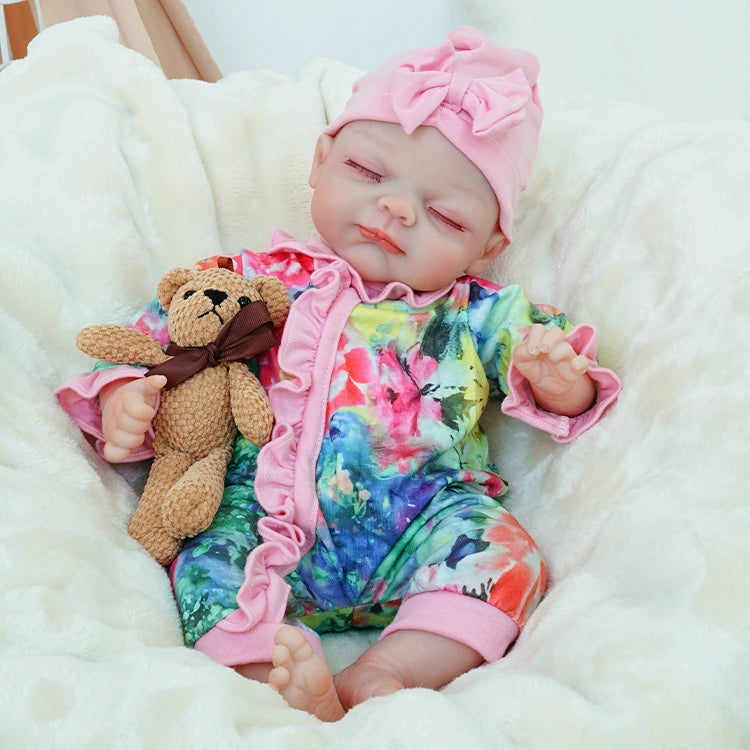 reborn baby doll | baby dolls | real life baby dolls | real baby dolls | newborn baby dolls | dolls that look real | ultra-soft vinyl | hand-rooted hair | gentle touch | realistic eyes | collectible doll