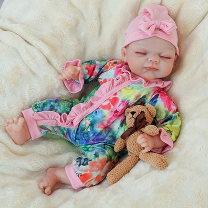 reborn baby doll | baby dolls | real life baby dolls | real baby dolls | newborn baby dolls | dolls that look real | ultra-soft vinyl | hand-rooted hair | gentle touch | realistic eyes | collectible doll