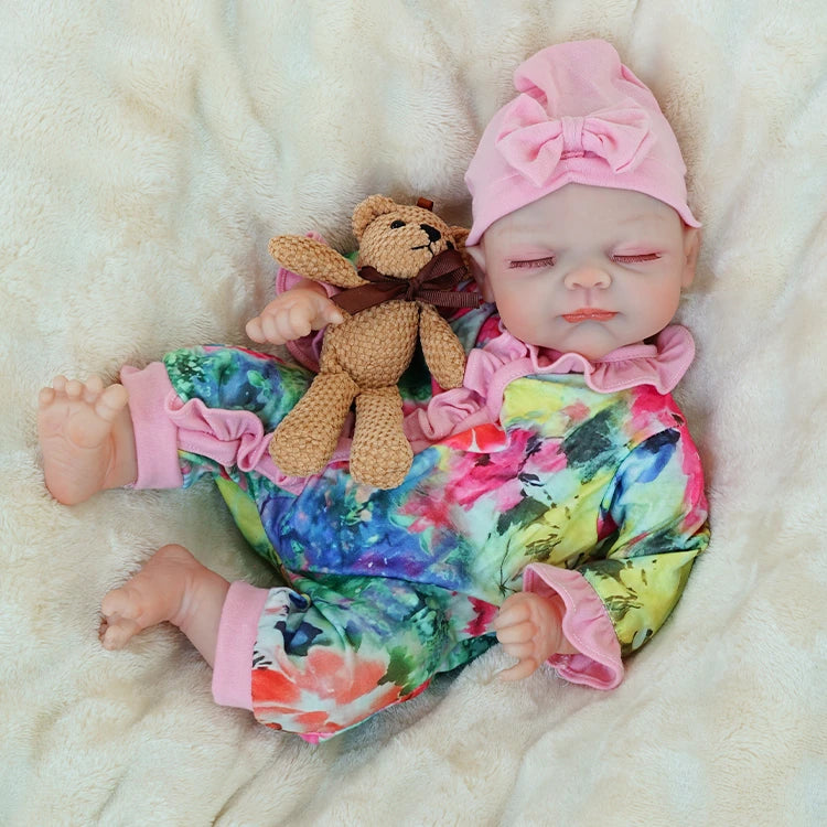 reborn baby doll | baby dolls | real life baby dolls | real baby dolls | newborn baby dolls | dolls that look real | ultra-soft vinyl | hand-rooted hair | gentle touch | realistic eyes | collectible doll