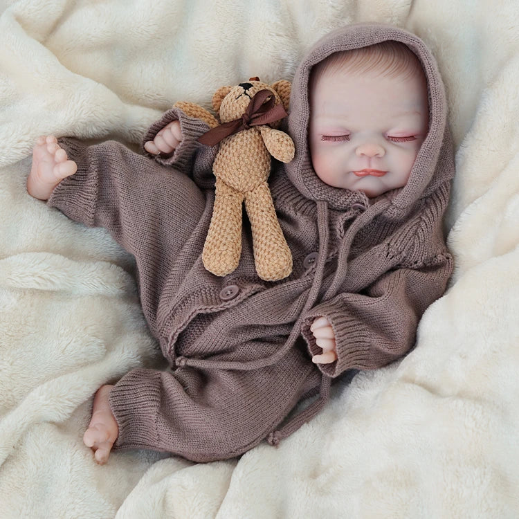 reborn baby doll | baby dolls | real life baby dolls | real baby dolls | newborn baby dolls | dolls that look real | ultra-soft vinyl | hand-rooted hair | gentle touch | realistic eyes | collectible doll