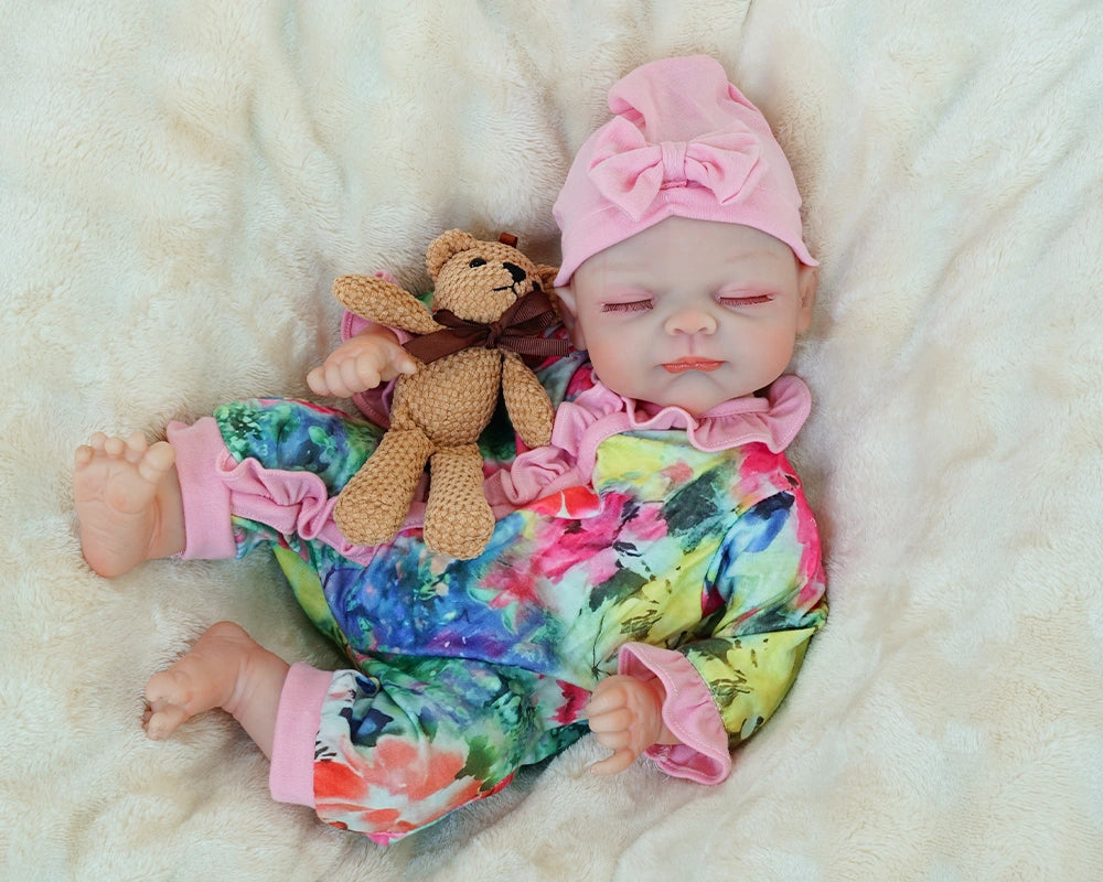 reborn baby doll | baby dolls | real life baby dolls | real baby dolls | newborn baby dolls | dolls that look real | ultra-soft vinyl | hand-rooted hair | gentle touch | realistic eyes | collectible doll