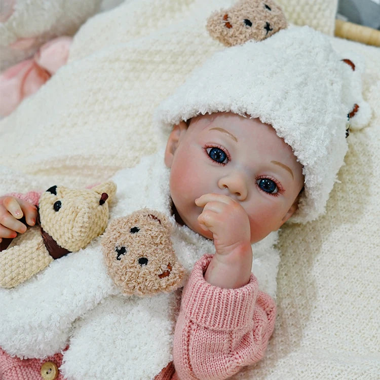 realistic dolls | reborn baby dolls | real life baby dolls | real baby dolls | for doll therapy | for anxiety relief | for dementia patients | as a keepsake doll | for doll enthusiasts | with realistic features | with soft skin | that look real | for display | for collecting
