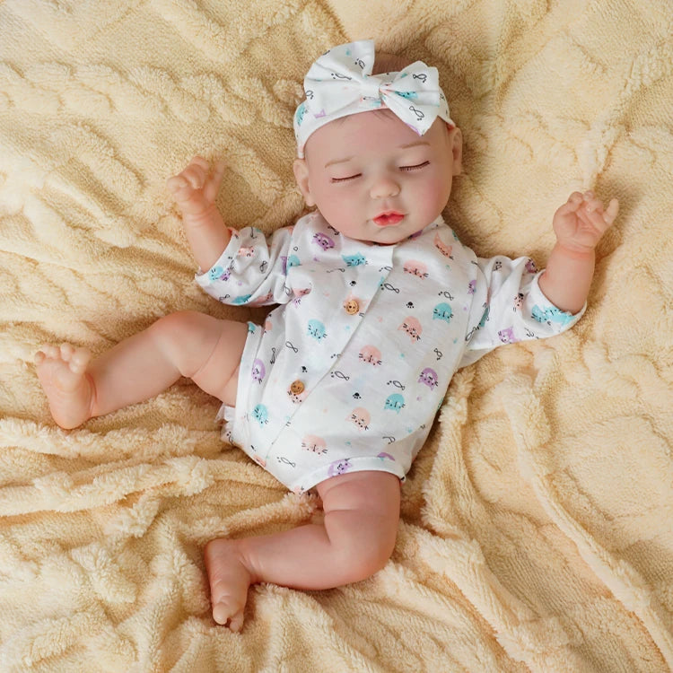 baby dolls | realistic baby dolls | sleeping reborn dolls | sleeping doll | squishy dolls | peaceful expression | soft and cuddly | delicate hand-painted features | gentle embrace | bedtime companion