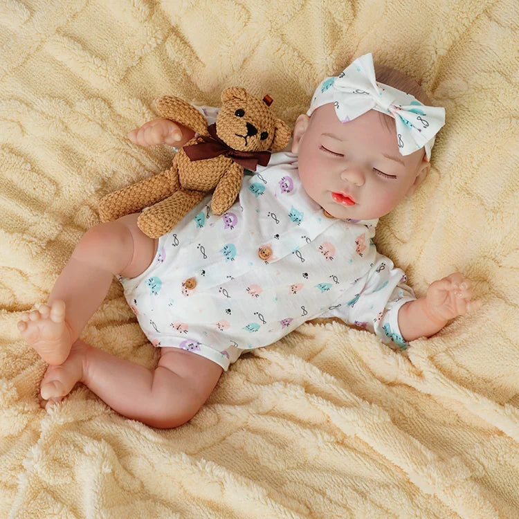baby dolls | realistic baby dolls | sleeping reborn dolls | sleeping doll | squishy dolls | peaceful expression | soft and cuddly | delicate hand-painted features | gentle embrace | bedtime companion