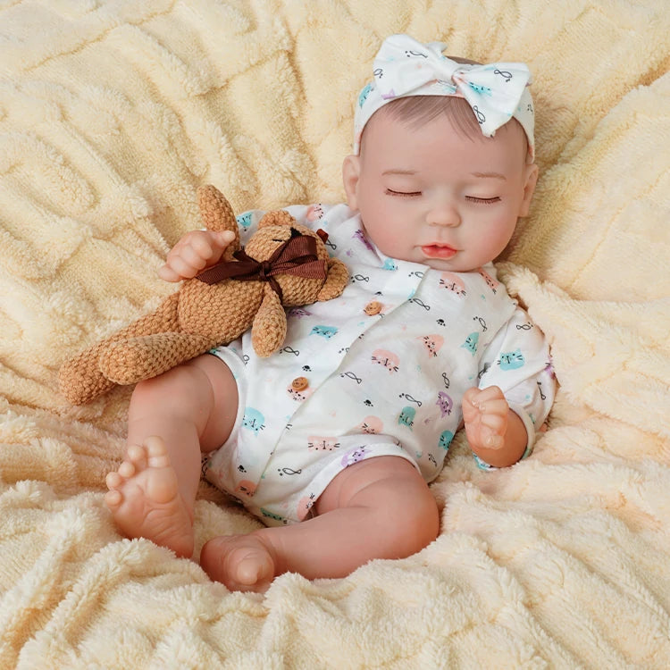 baby dolls | realistic baby dolls | sleeping reborn dolls | sleeping doll | squishy dolls | peaceful expression | soft and cuddly | delicate hand-painted features | gentle embrace | bedtime companion